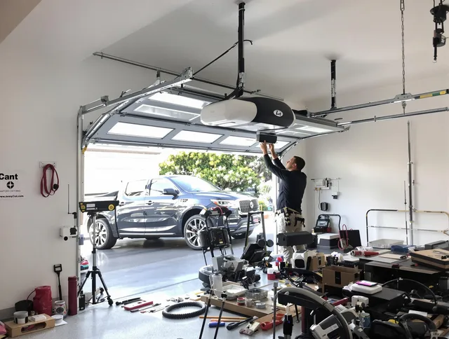 Weddington Garage Door Repair specialist installing smart garage door opener system in Weddington home