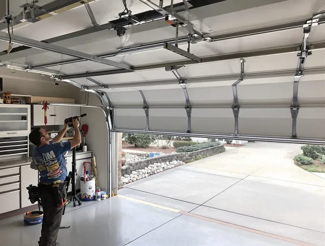 Garage door track repair service by Weddington Garage Door Repair in Weddington